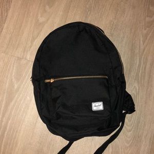 Herschel backpack black & gold
